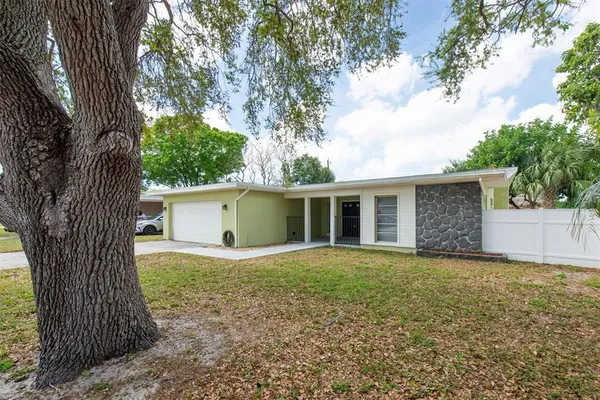 front view of a house with a yard