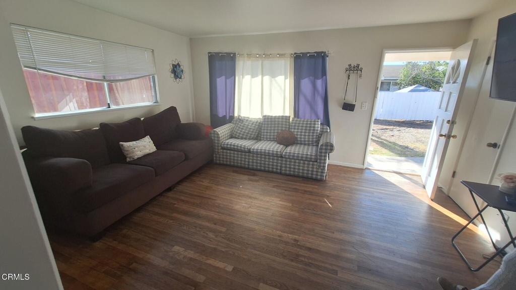 60 Princeton Avenue Oxnard, CA 93036 - Photo 2 of 10 a living room with furniture and a large window