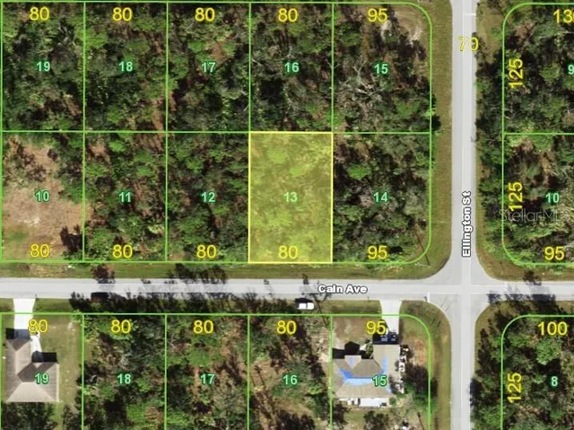 a bathroom with a window and mirror