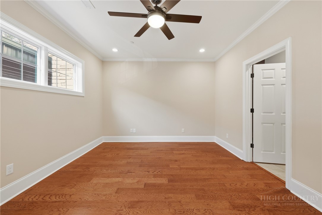 155 Gateway Drive, Unit 102 Boone, NC 28607 - Photo 19 of 43 a view of an empty room with a window