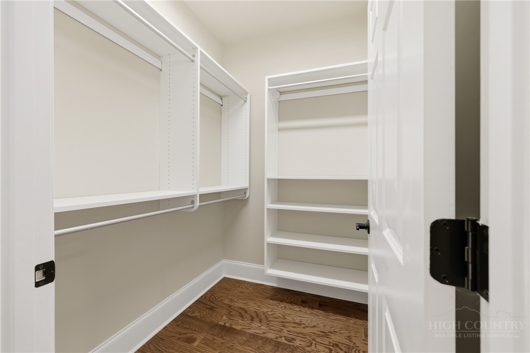 155 Gateway Drive, Unit 102 Boone, NC 28607 - Photo 21 of 43 a view of walk in closet with empty racks