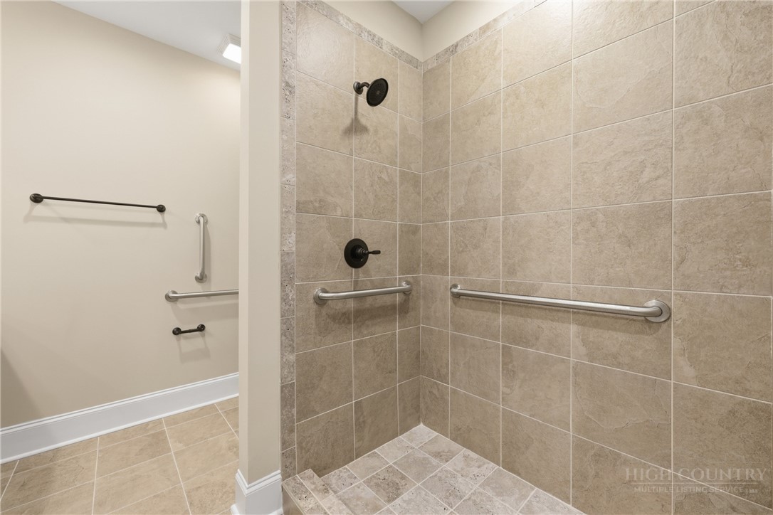 155 Gateway Drive, Unit 102 Boone, NC 28607 - Photo 23 of 43 a bathroom with a shower