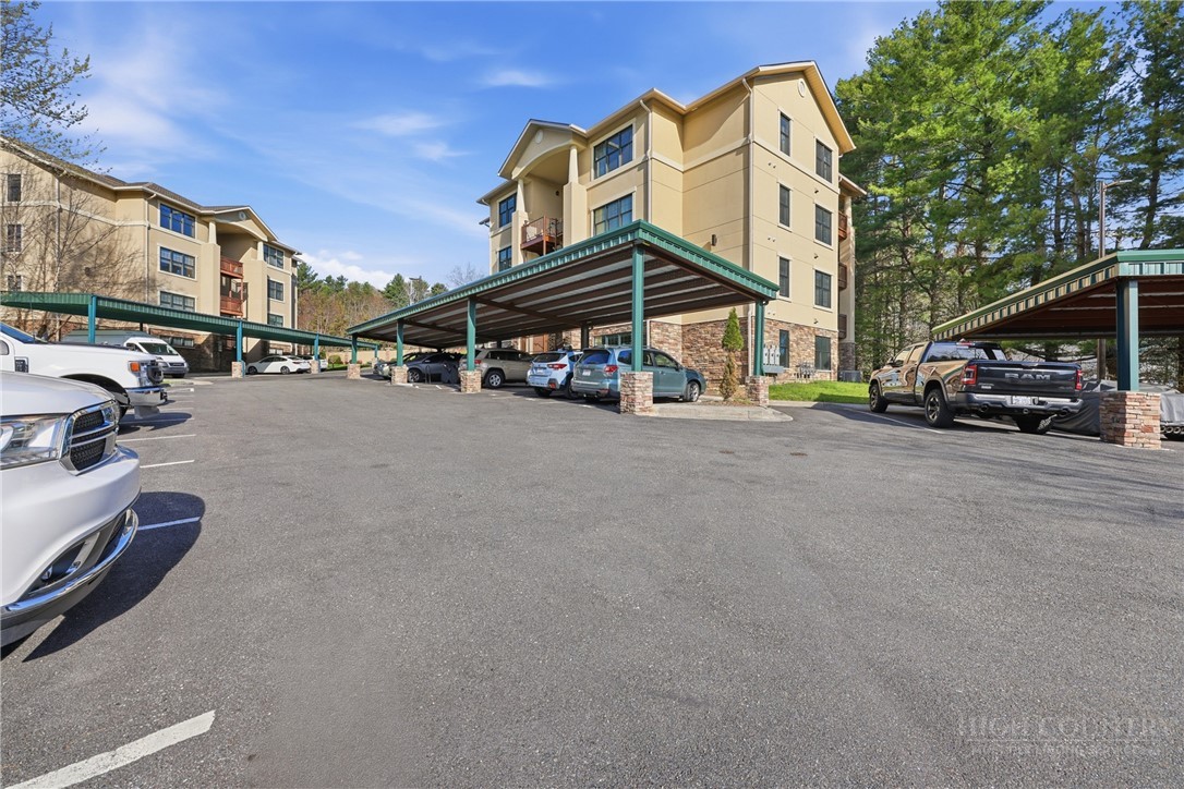 155 Gateway Drive, Unit 102 Boone, NC 28607 - Photo 35 of 43 a view of a street with cars