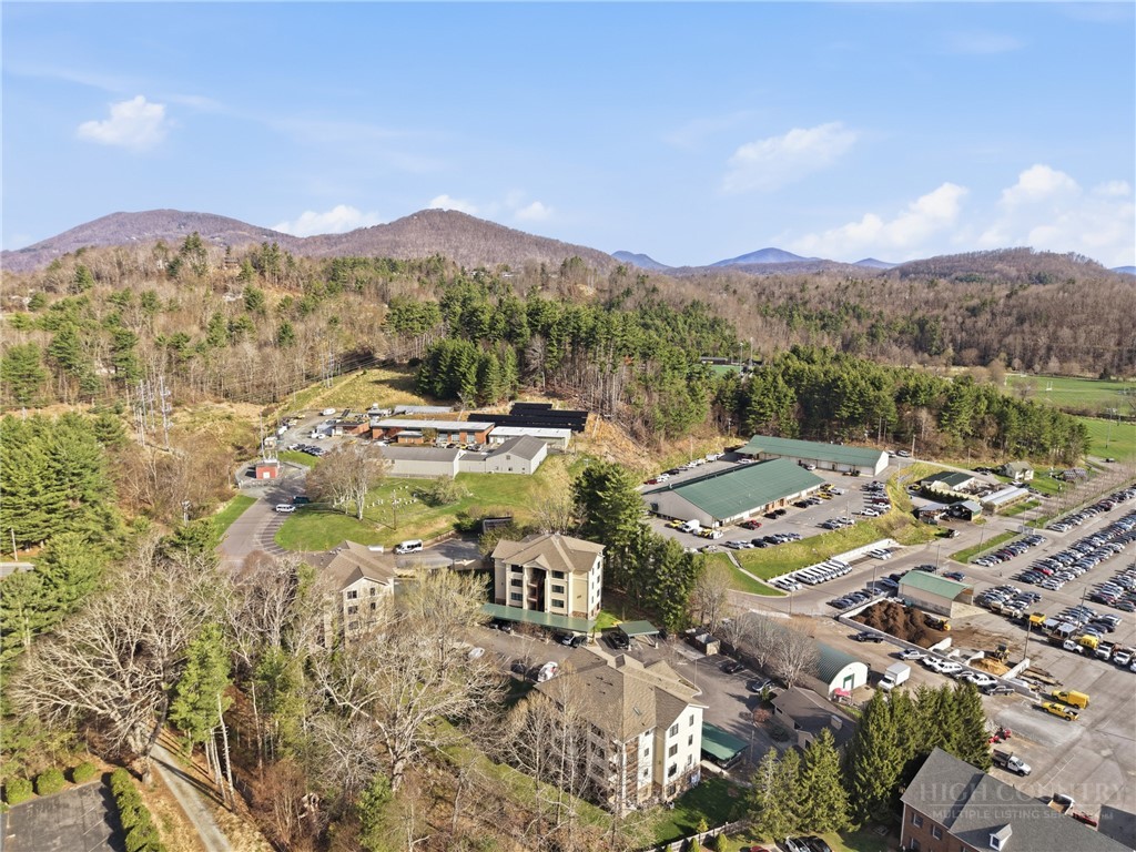 155 Gateway Drive, Unit 102 Boone, NC 28607 - Photo 41 of 43 a view of a city with mountains in the background
