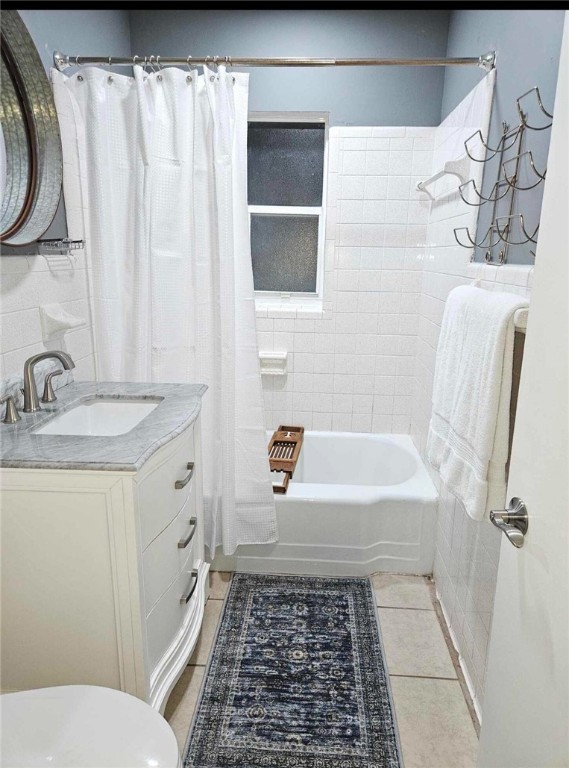 3716 Atlantic Boulevard Vero Beach, FL 32960 - Photo 13 of 22 a bathroom with a granite countertop sink toilet and shower