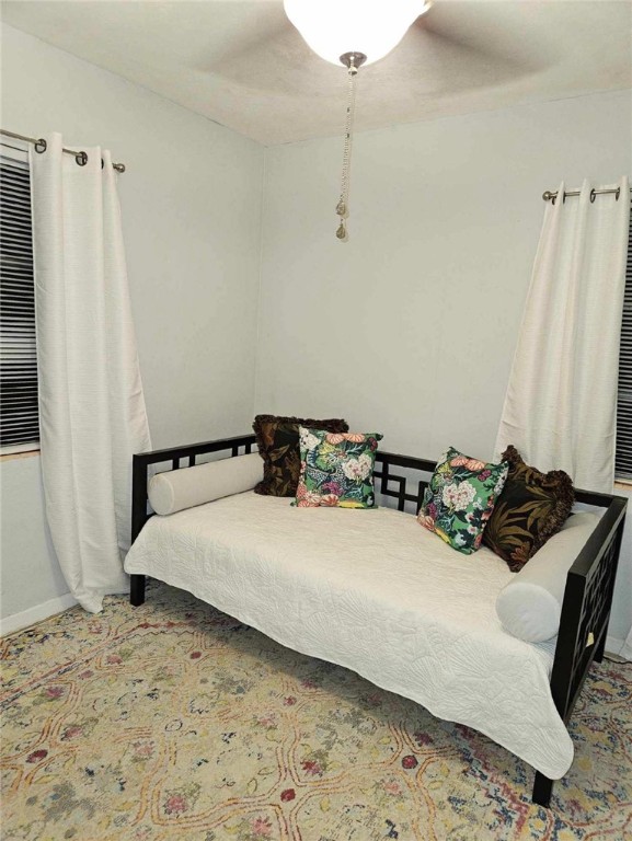 3716 Atlantic Boulevard Vero Beach, FL 32960 - Photo 14 of 22 a bedroom with a bed and a window