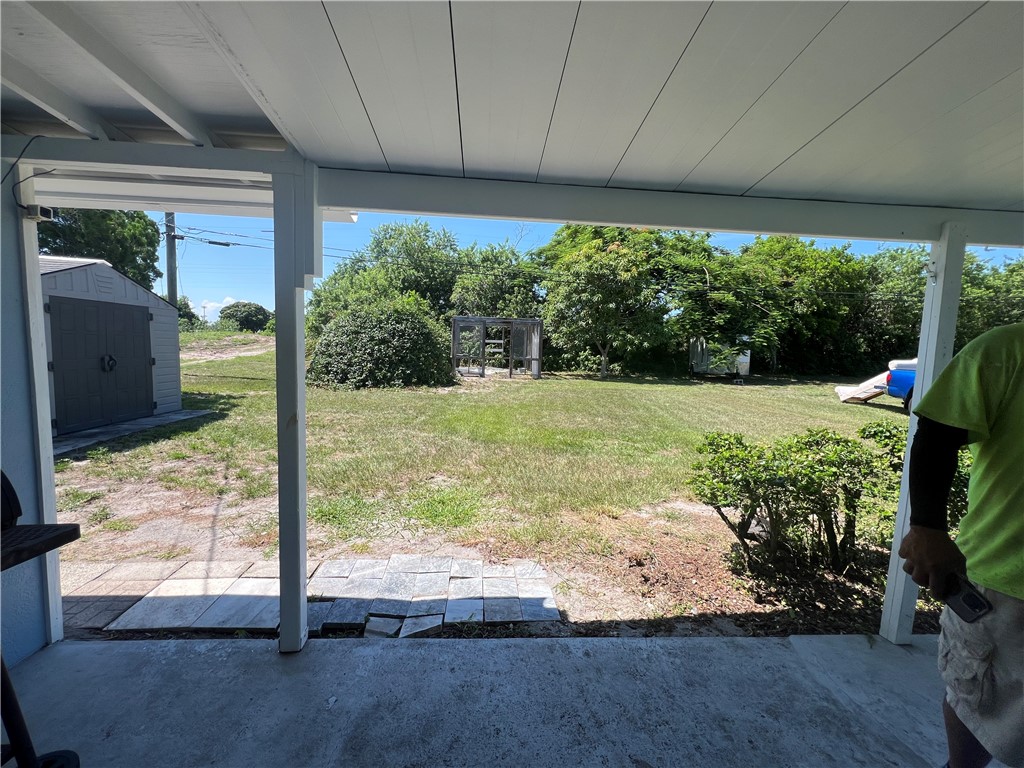 3716 Atlantic Boulevard Vero Beach, FL 32960 - Photo 16 of 22 a view of a backyard of the house