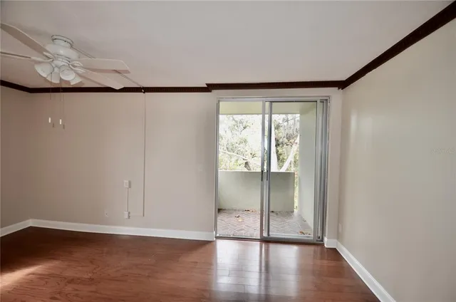 a bathroom with a granite countertop toilet a sink and a shower
