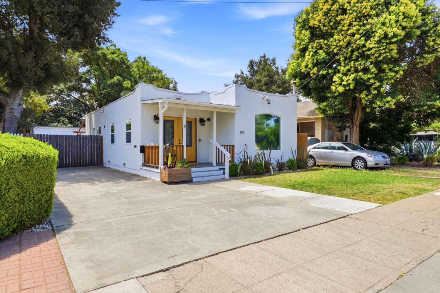 140 Second Street Gilroy, CA 95020 - Photo 3 of 33 a view of a house with a yard and large tree