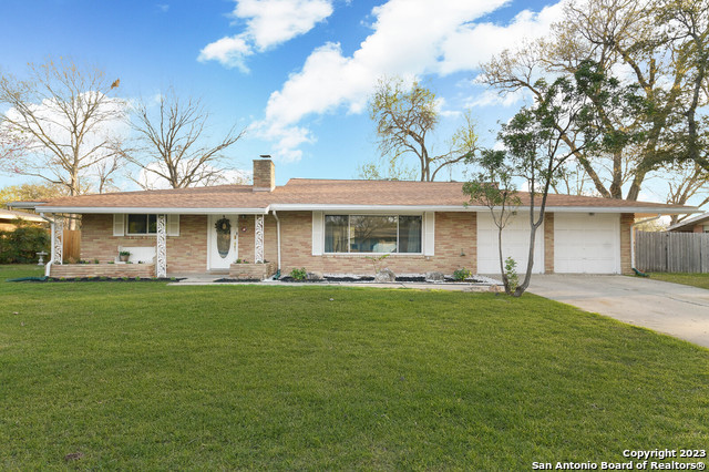 226 Driftwind Drive Windcrest, TX 78239 - Photo 1 of 1 a front view of a house with a garden