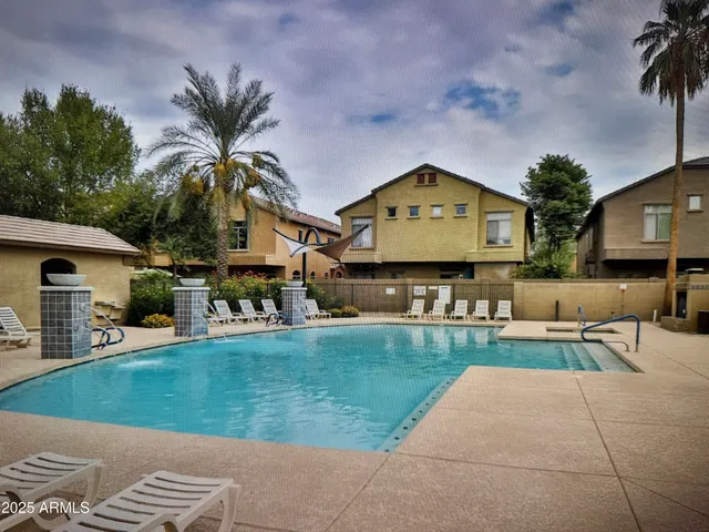 a house view with a sitting space and garden space