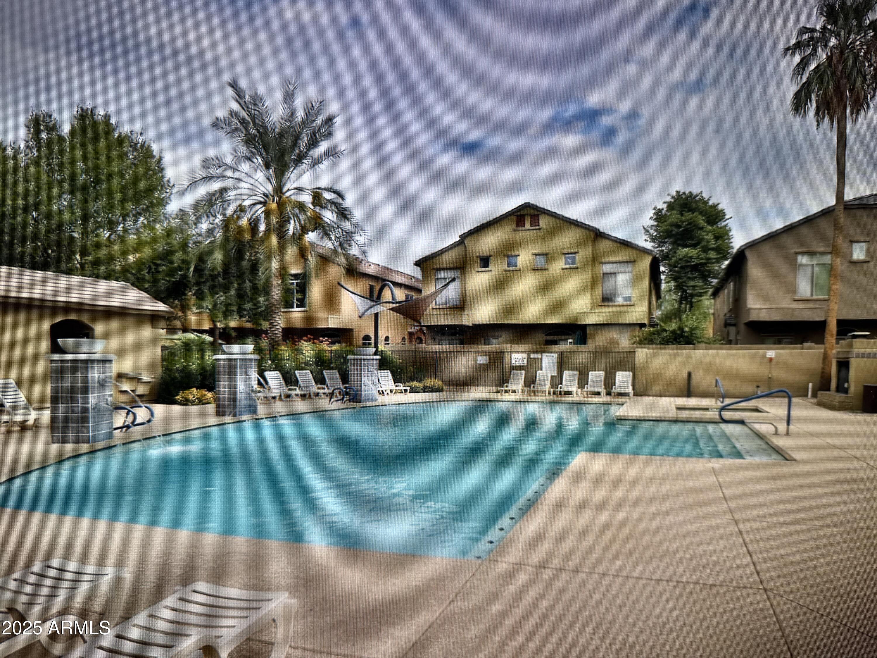 2150 West Alameda Road, Unit 1259 Phoenix, AZ 85085 - Photo 17 of 18 a house view with a sitting space and garden space