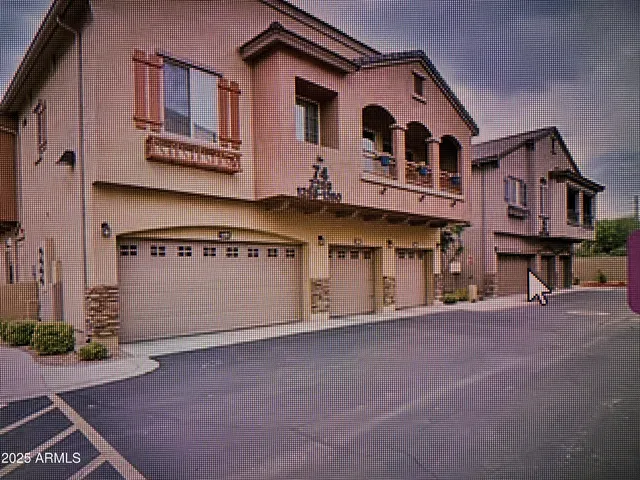 a view of a building with a street
