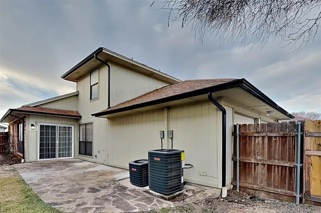 a front view of a house with stairs