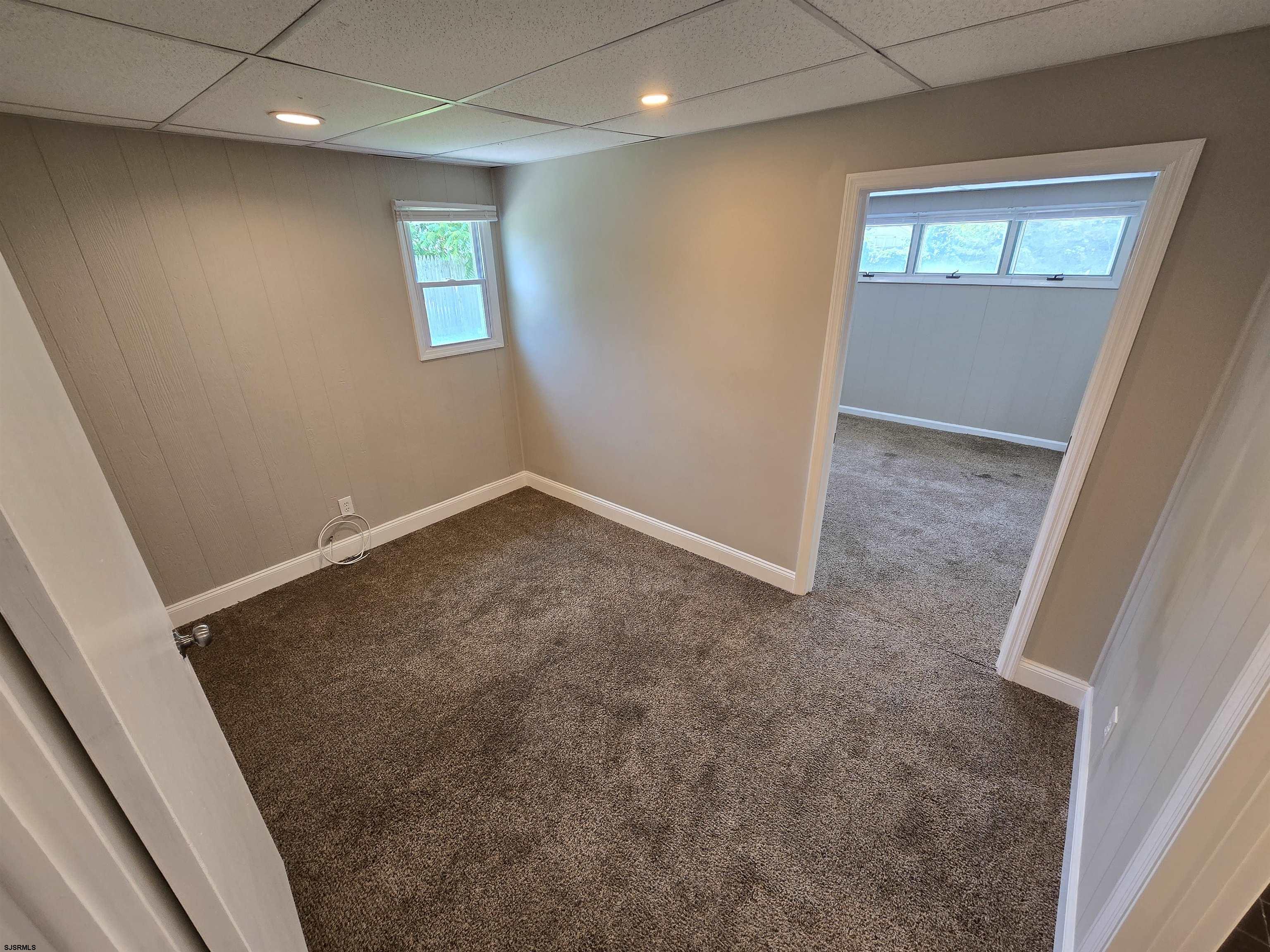 30 Mill Street, Unit C Mays Landing, NJ 08330 - Photo 11 of 15 an empty room with windows