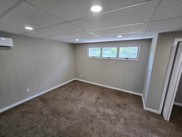 an empty room with a hallway