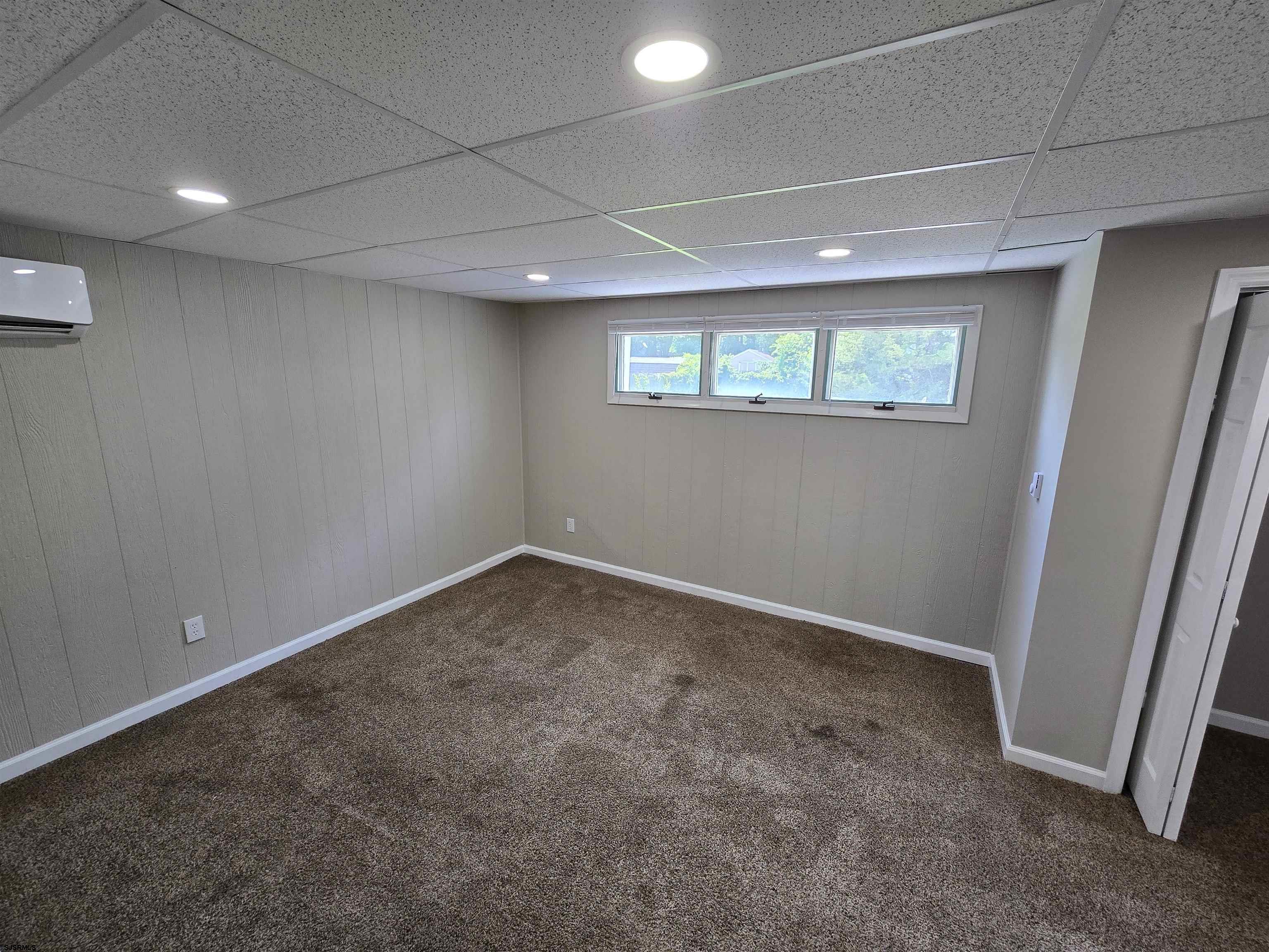 30 Mill Street, Unit C Mays Landing, NJ 08330 - Photo 12 of 15 an empty room with a hallway