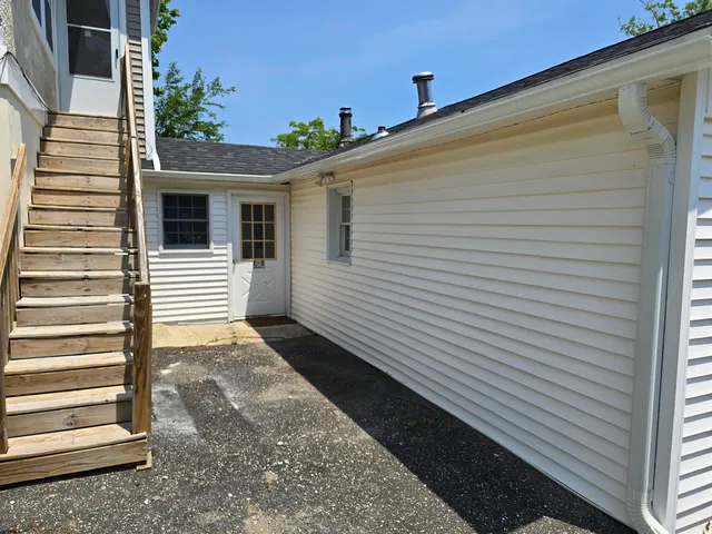 a view of a back yard of the house