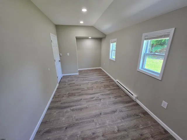 a view of an empty room and window