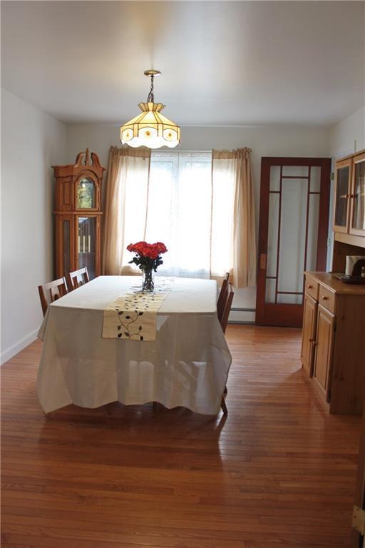 207 Jack Hall Road New Gloucester, ME 04260 - Photo 11 of 42 Formal dining area with hardwood...