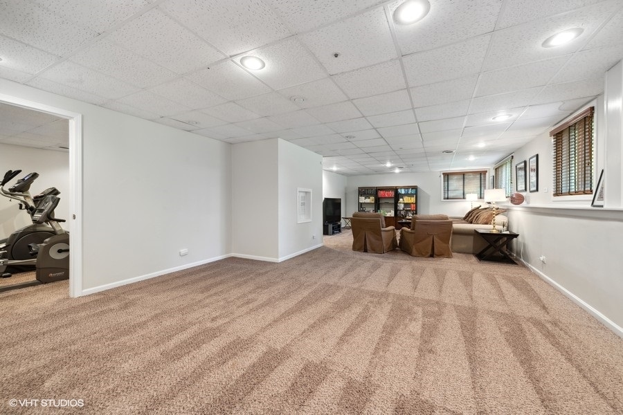 5908 Kildeer Court Long Grove, IL 60047 - Photo 18 of 23 a view of a livingroom with furniture and cars