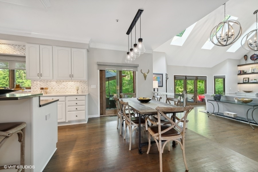 5908 Kildeer Court Long Grove, IL 60047 - Photo 5 of 23 a view of a dining room with furniture window and wooden floor