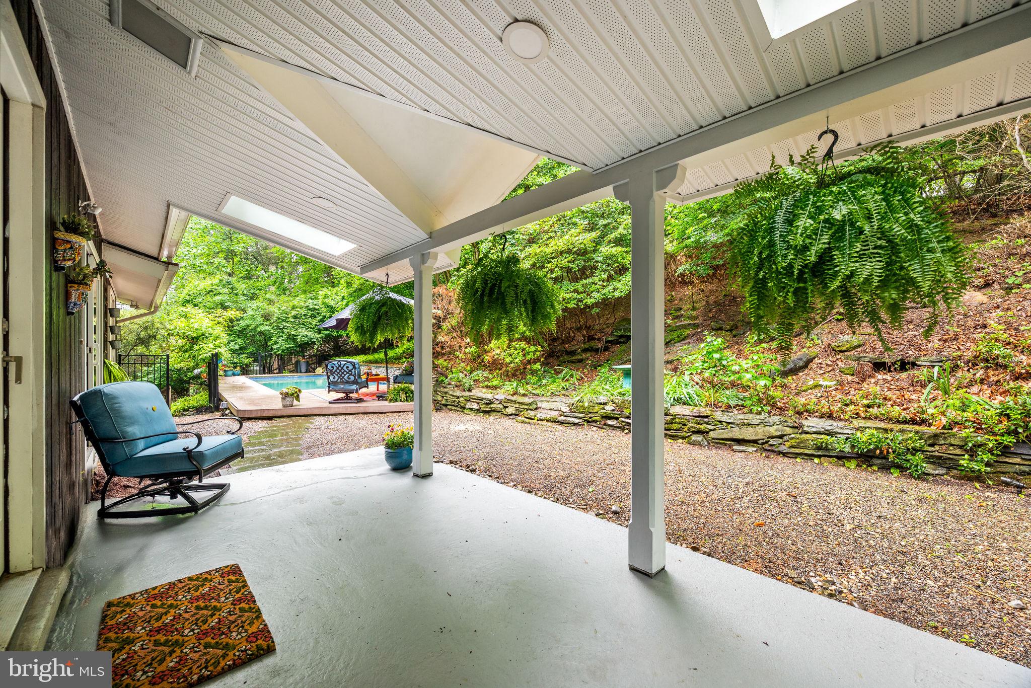 422 Oak Valley Road Media, PA 19063 - Photo 30 of 34 Covered Porch overlooking pool