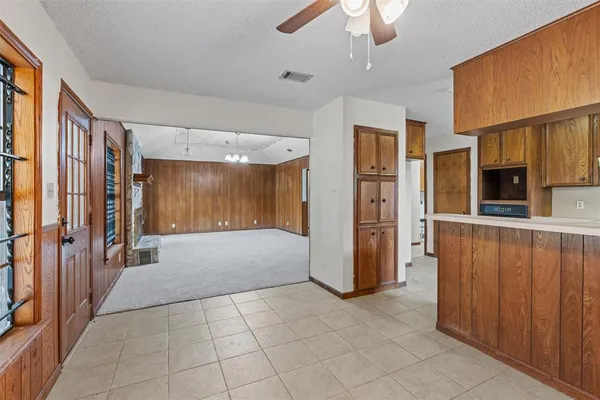 a view of a entryway with furniture and wooden floor