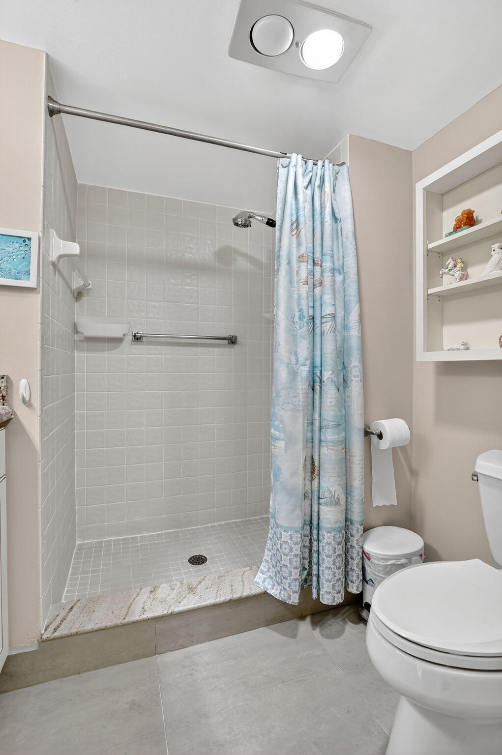 5340 Northwest 2nd Avenue, Unit 226 Boca Raton, FL 33487 - Photo 24 of 39 a bathroom with a shower and a toilet