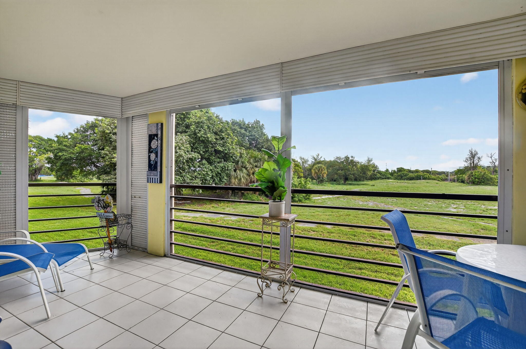 5340 Northwest 2nd Avenue, Unit 226 Boca Raton, FL 33487 - Photo 31 of 39 a view of a two chair in the balcony