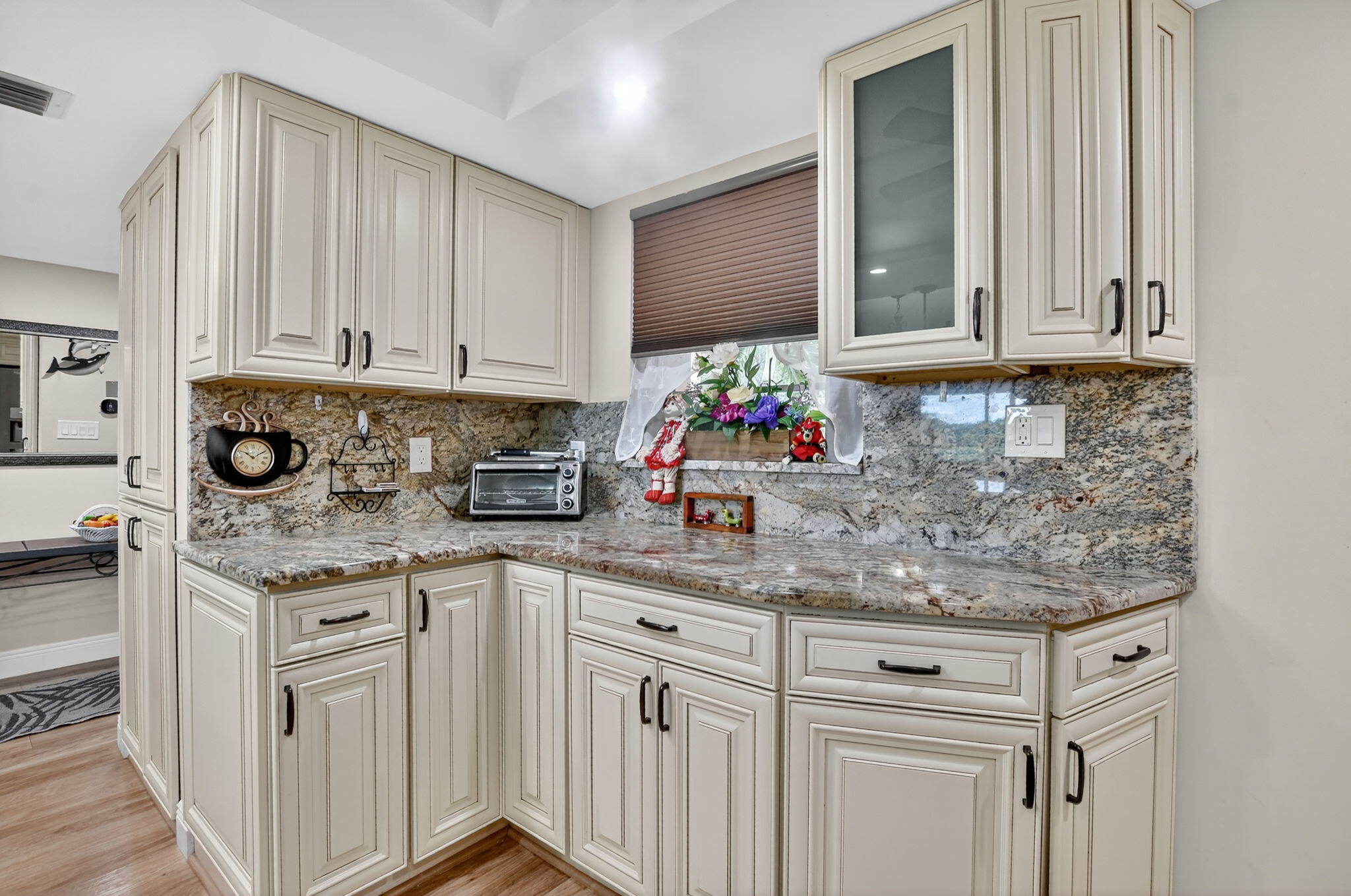 5340 Northwest 2nd Avenue, Unit 226 Boca Raton, FL 33487 - Photo 8 of 39 a kitchen with stainless steel appliances granite countertop a sink stove and cabinets