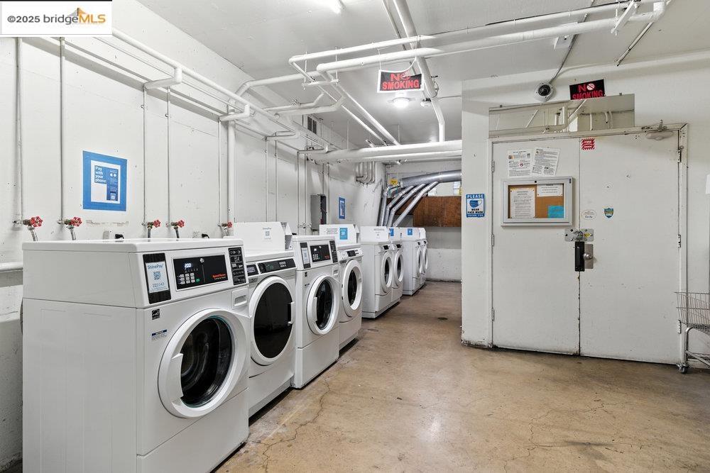 2601 College Avenue, Unit 203 Berkeley, CA 94704 - Photo 16 of 22 Community laundry featuring separate washer and dryer