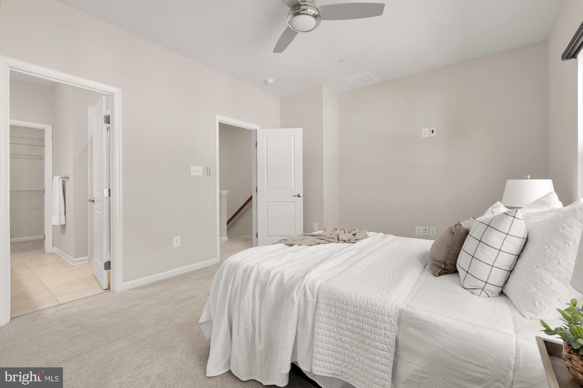 1440 Strahorn Road Hanover, MD 21076 - Photo 36 of 49 a bedroom with a bed and a chandelier