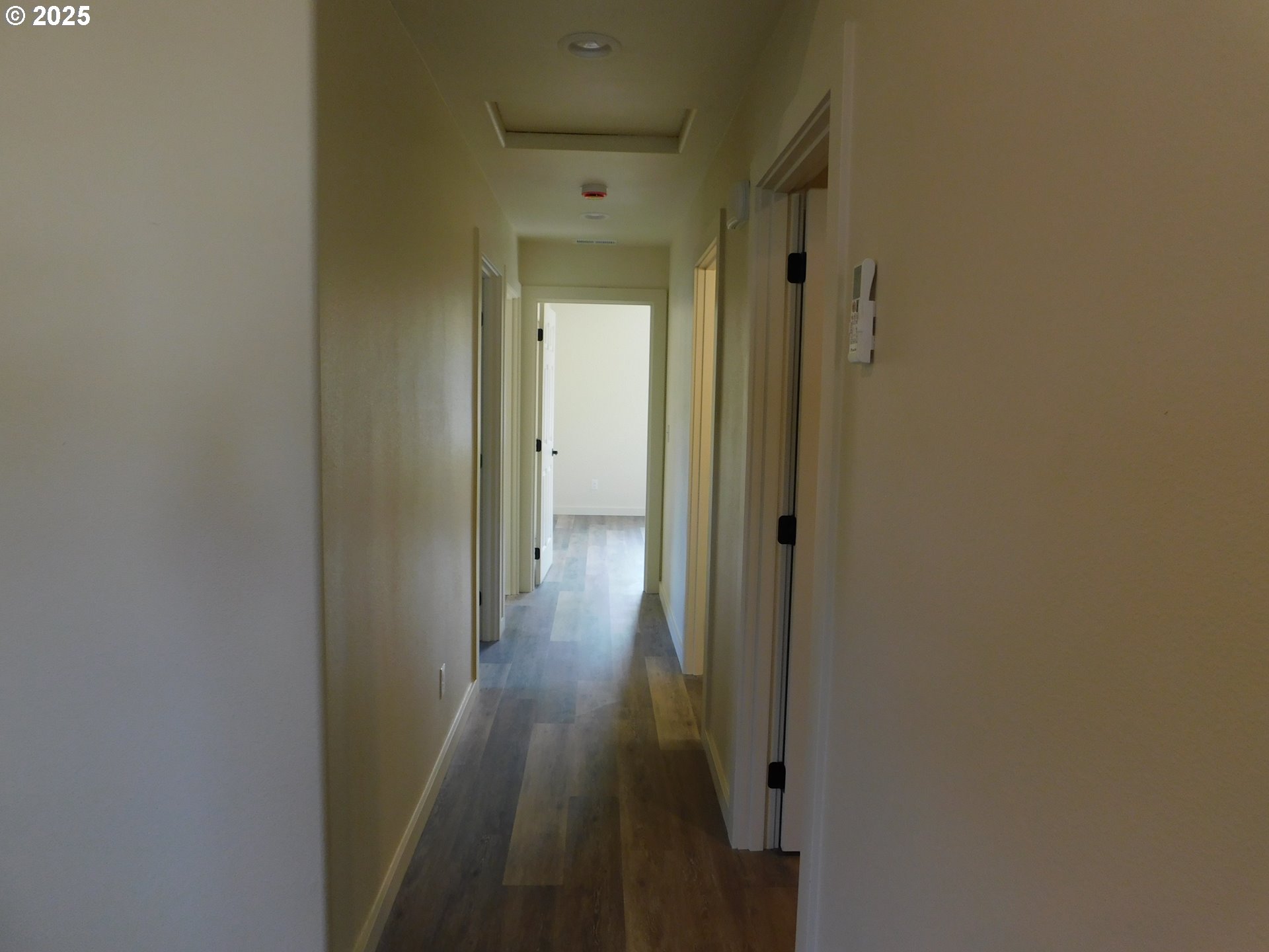 130 East Date Street Powers, OR 97466 - Photo 13 of 29 a view of a hallway with wooden floor
