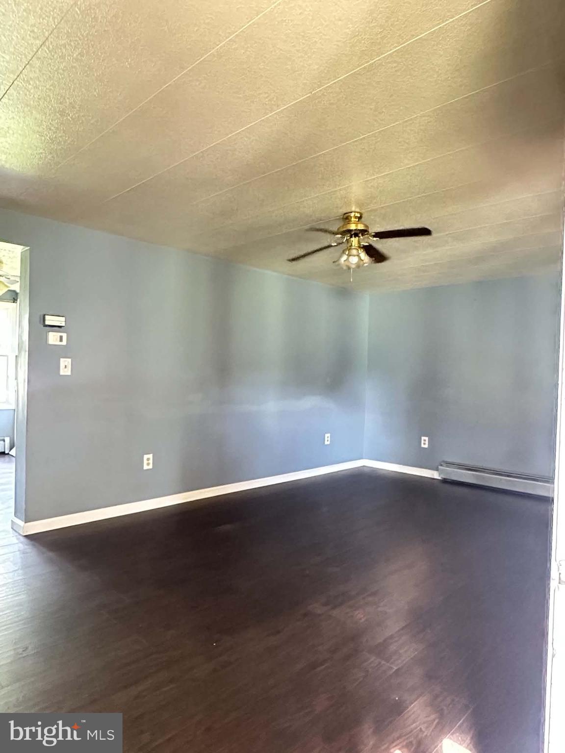 805 Baltimore Road Shippensburg, PA 17257 - Photo 4 of 23 a view of a room with wooden floor