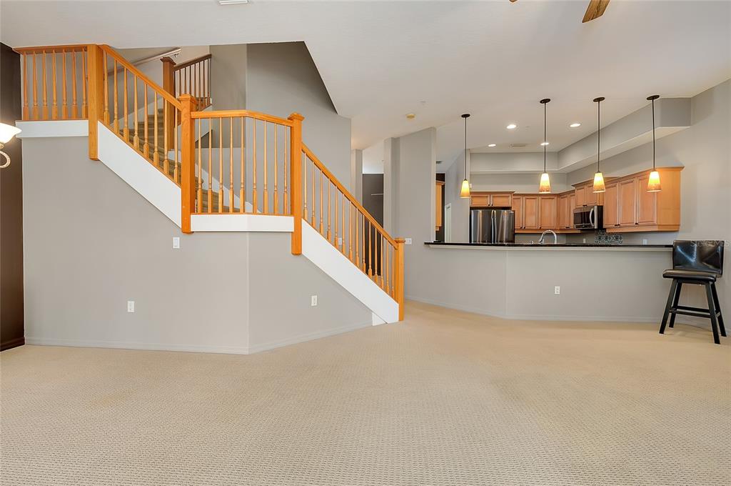 3975 Square E Lane, Unit 9 Sarasota, FL 34238 - Photo 12 of 52 a view of a kitchen with furniture and windows