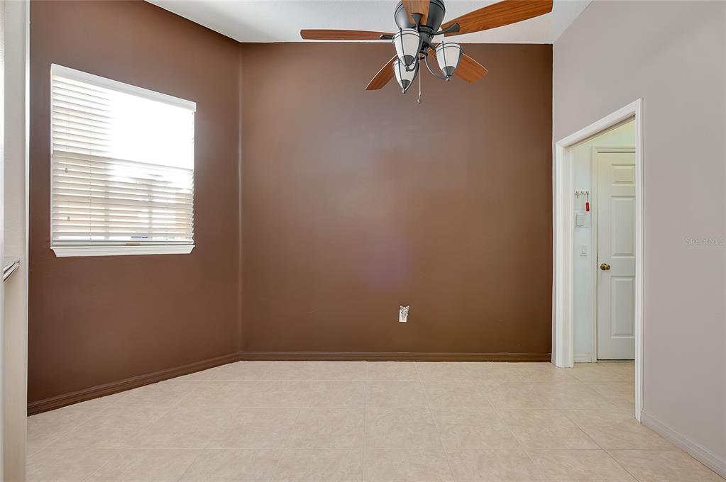 3975 Square E Lane, Unit 9 Sarasota, FL 34238 - Photo 15 of 52 an empty room with a window