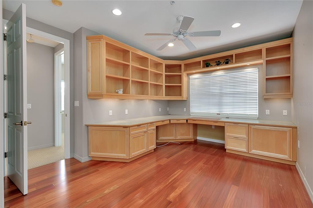3975 Square E Lane, Unit 9 Sarasota, FL 34238 - Photo 36 of 52 a living room with stainless steel appliances wooden floors and view living room