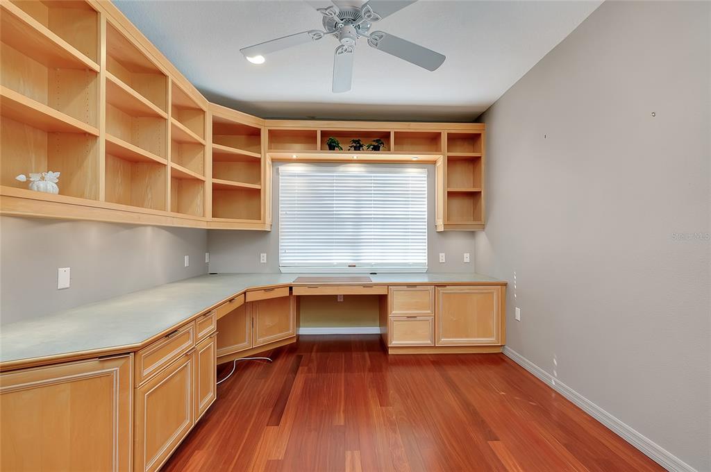 3975 Square E Lane, Unit 9 Sarasota, FL 34238 - Photo 39 of 52 a kitchen with a sink window and cabinets
