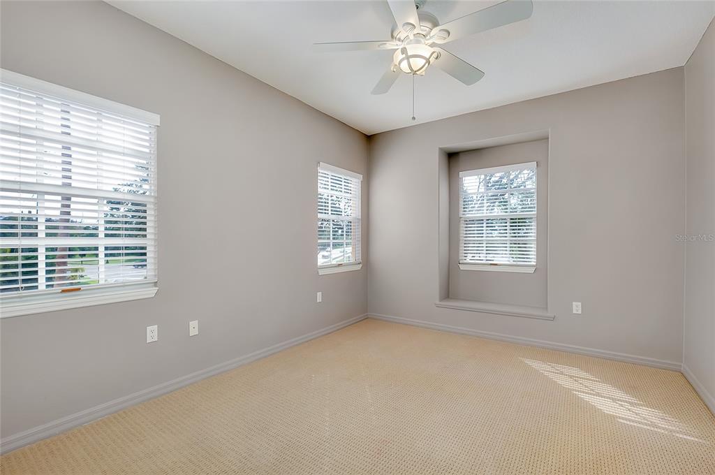 3975 Square E Lane, Unit 9 Sarasota, FL 34238 - Photo 40 of 52 a view of an empty room with a window