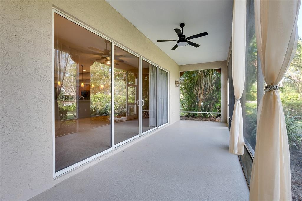 3975 Square E Lane, Unit 9 Sarasota, FL 34238 - Photo 46 of 52 a view of a hallway with windows