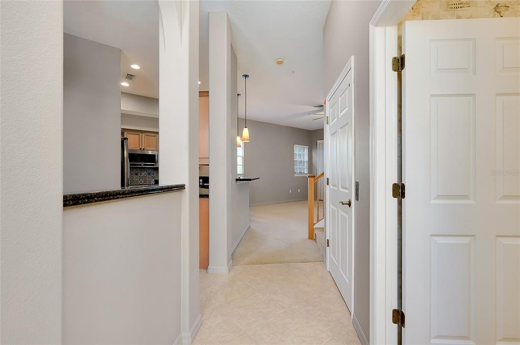 3975 Square E Lane, Unit 9 Sarasota, FL 34238 - Photo 6 of 52 a view of a hallway with a rooms