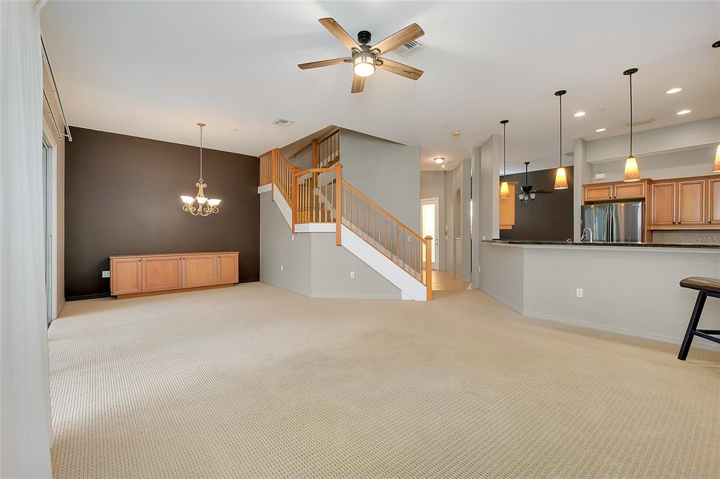 3975 Square E Lane, Unit 9 Sarasota, FL 34238 - Photo 9 of 52 a view of a hallway with a kitchen