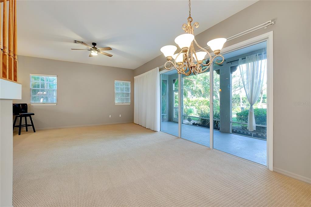 3975 Square E Lane, Unit 9 Sarasota, FL 34238 - Photo 10 of 52 a view of an empty room with a window