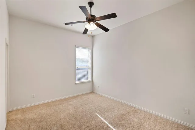 a bathroom with a sink a toilet and a mirror a bathtub