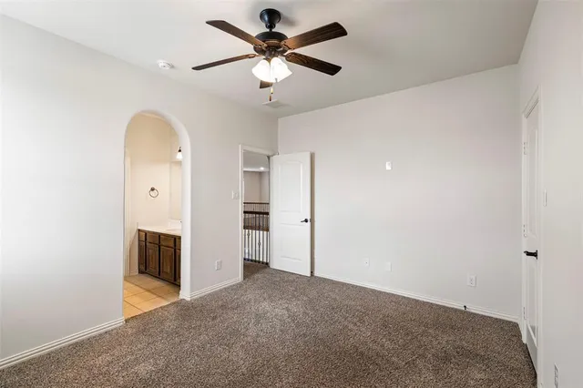 a bathroom with a sink vanity granite and a mirror