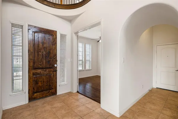 a view of entryway with wooden floor