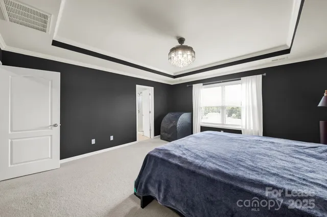 a spacious bathroom with a double vanity sink mirror and