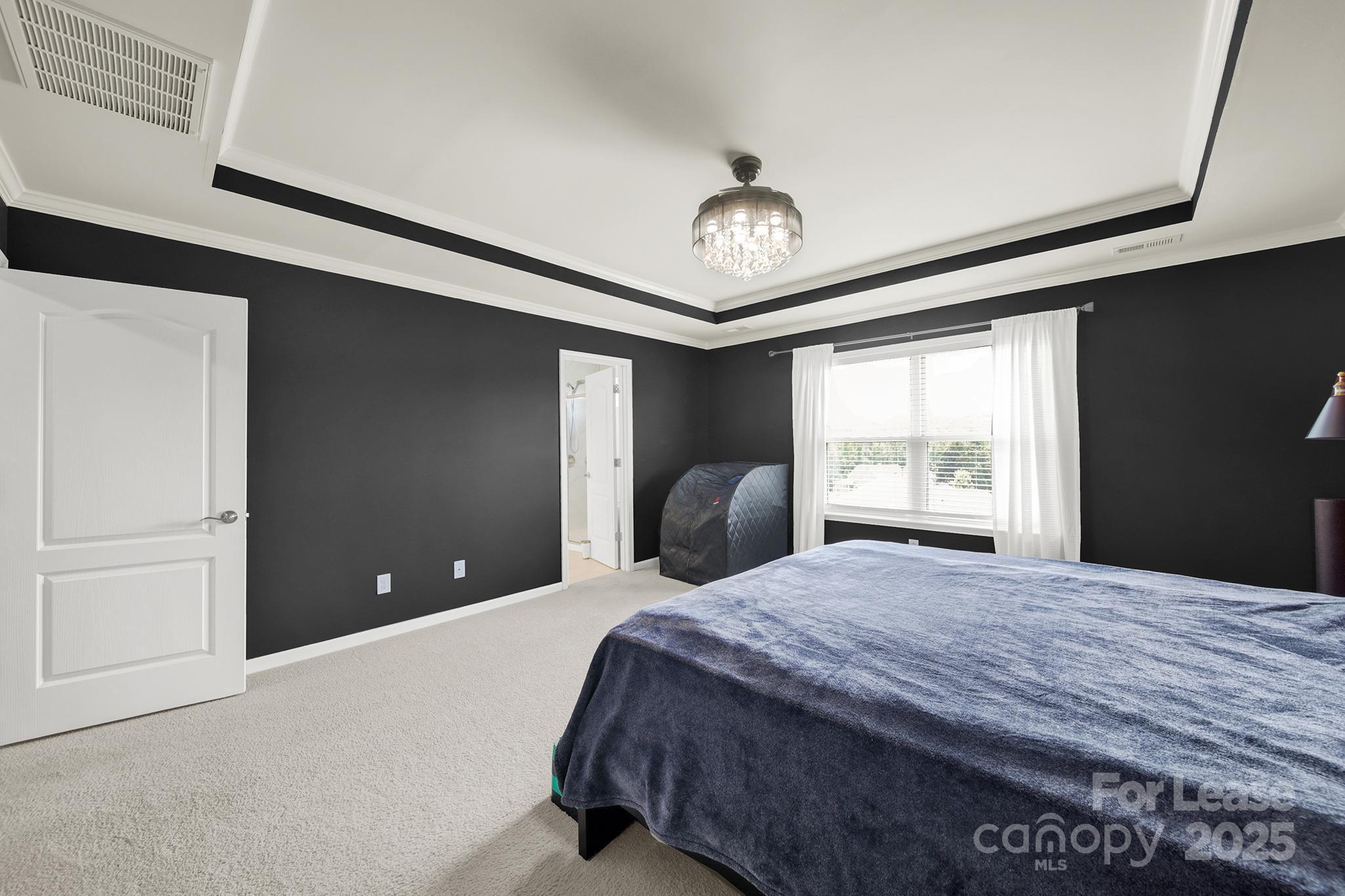 2040 Donaldson Street Fort Mill, SC 29707 - Photo 28 of 43 a bedroom with a large bed and a large window