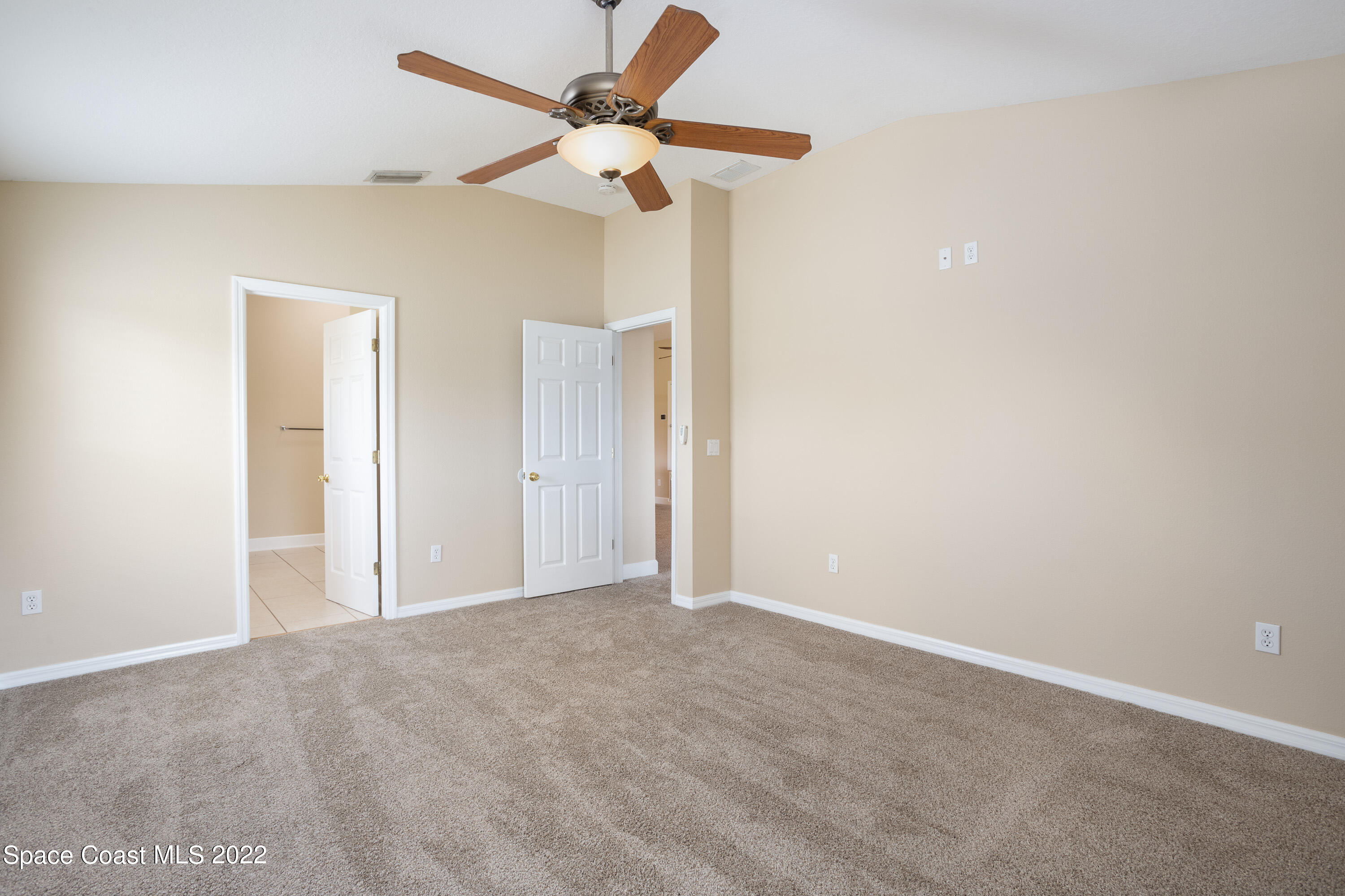 2400 Bridgeport Circle Rockledge, FL 32955 - Photo 15 of 31 a view of a big room with carpet
